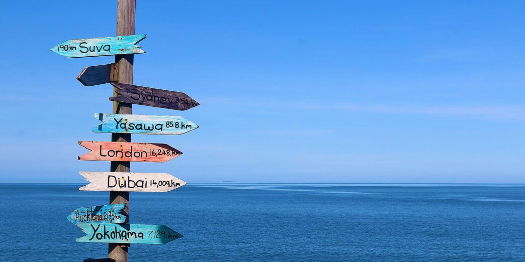 a sign post with different directions