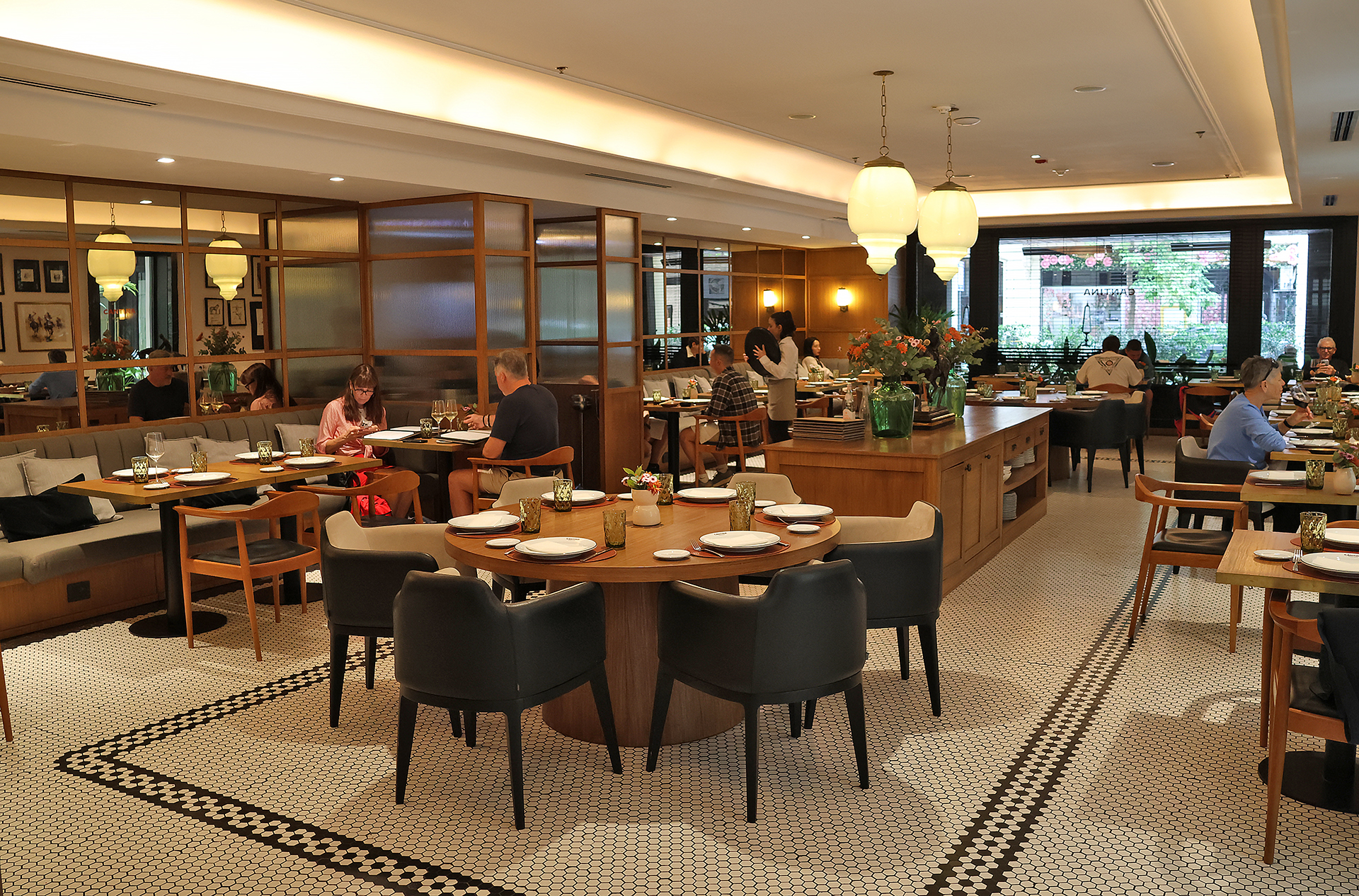 a restaurant with many tables and chairs