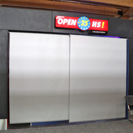 a large sliding door with a sign