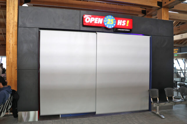 a large sliding door with a sign