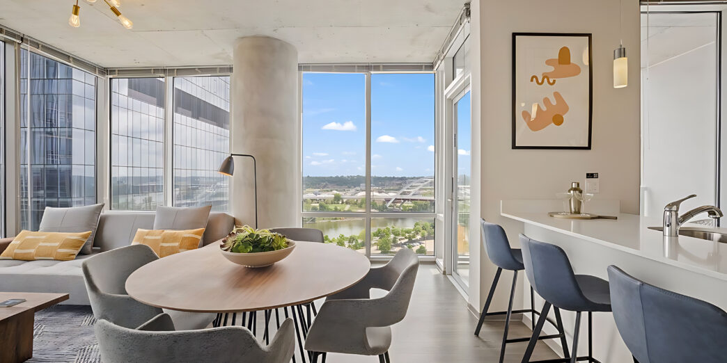 a room with a table and chairs