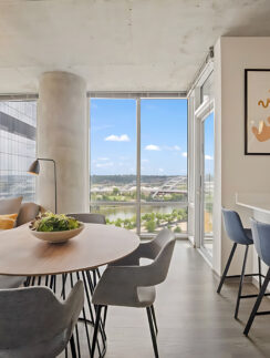 a room with a table and chairs