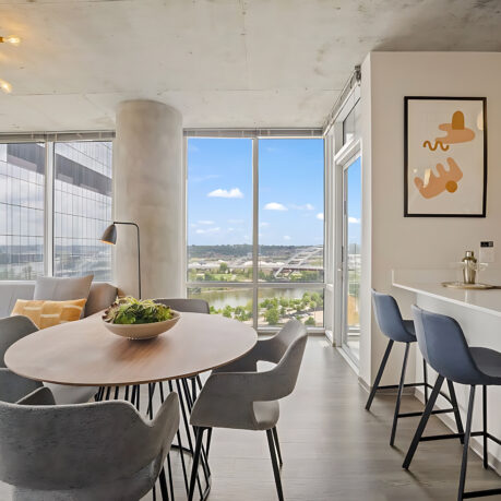 a room with a table and chairs