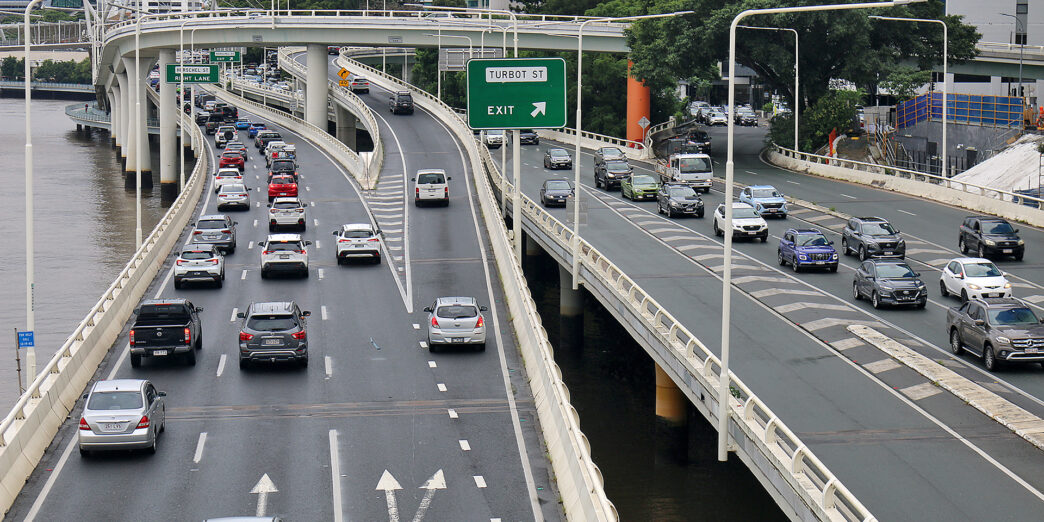 a highway with many cars on it