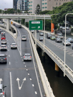 a highway with many cars on it