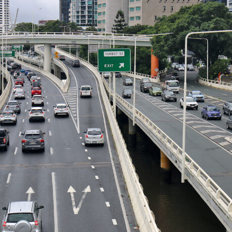 a highway with many cars on it