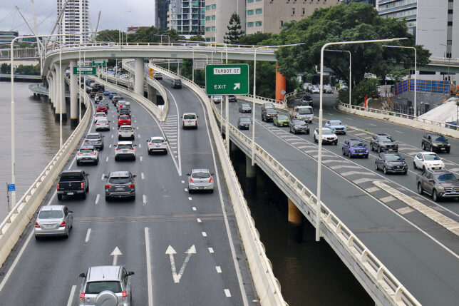 a highway with many cars on it