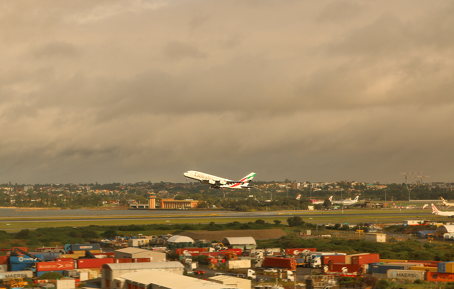 an airplane flying over a city