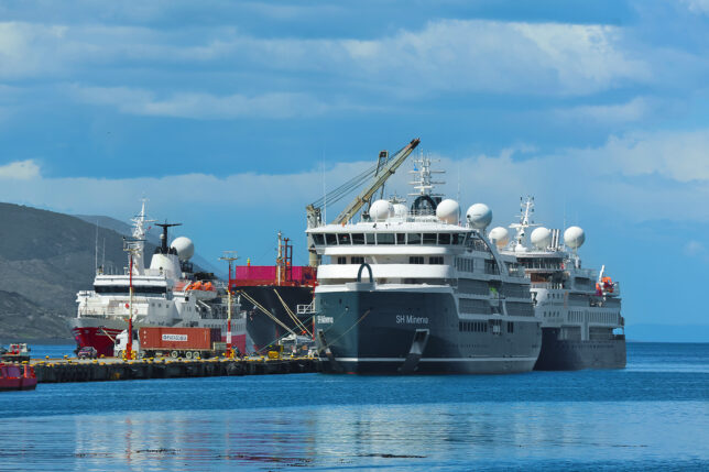a group of ships in a harbor