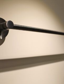 a metal bar on a wall