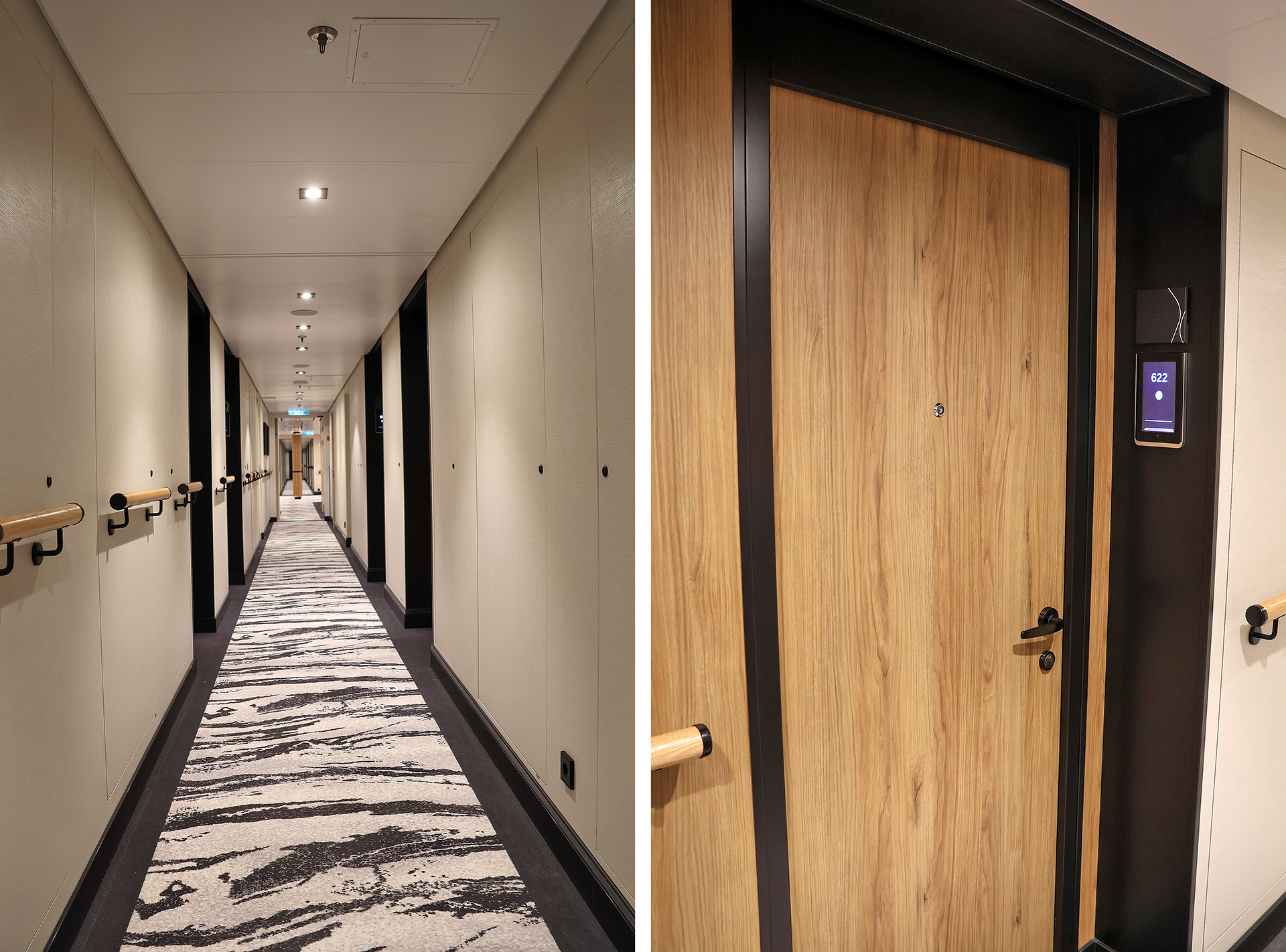 a long hallway with a door and a carpet