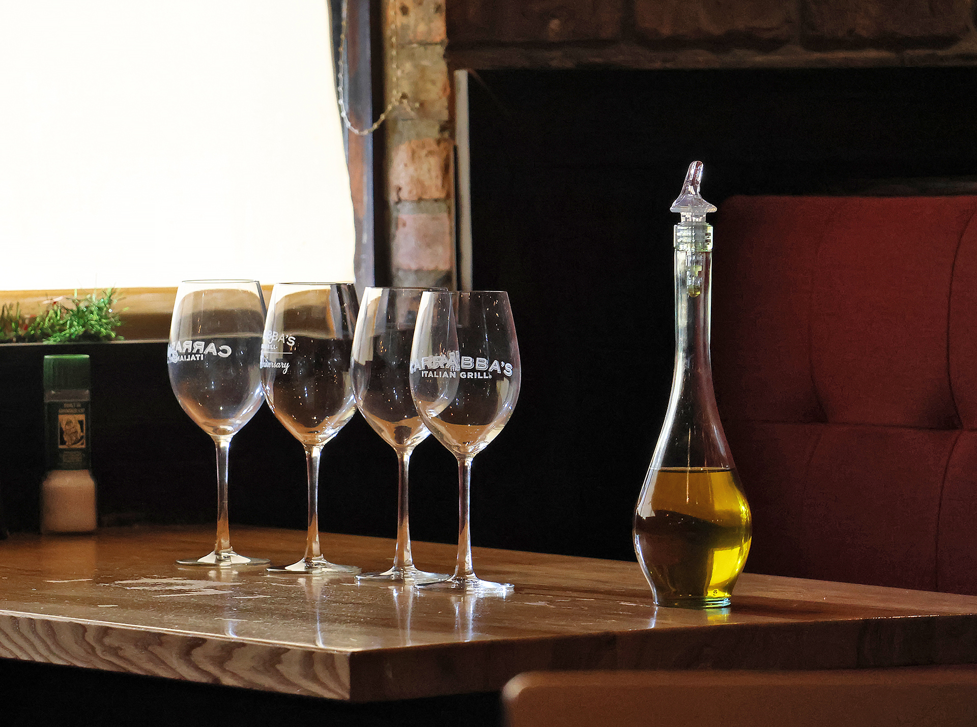 a group of wine glasses on a table