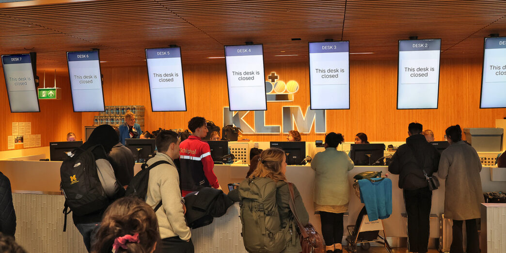 people standing in front of a counter