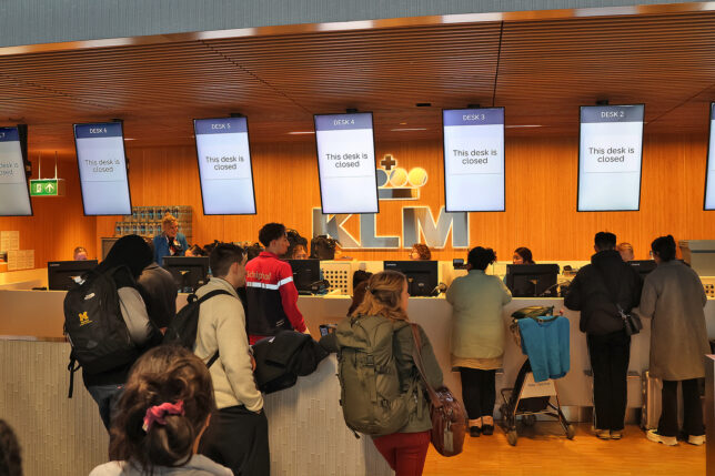 people standing in front of a counter