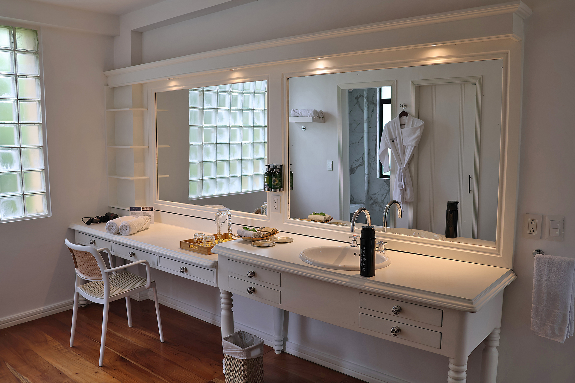 a bathroom with a large mirror