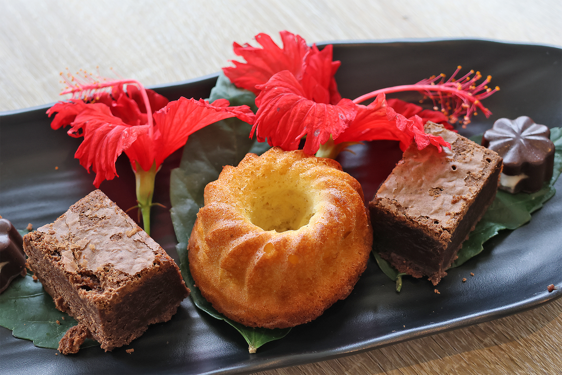 a plate of food with red flowers