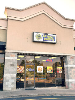 a store front with a sign on the front