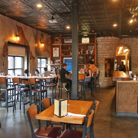 a room with tables and chairs