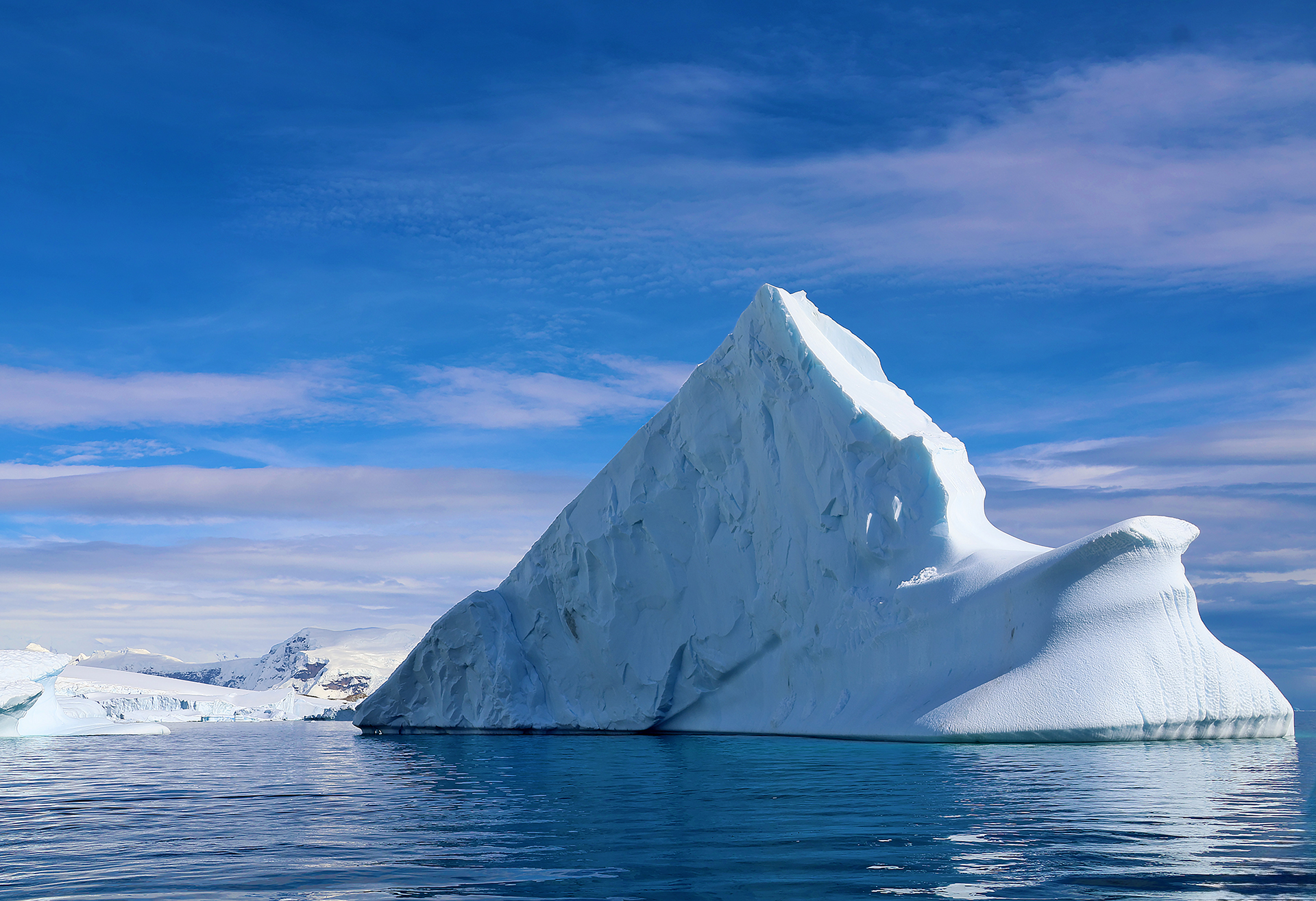 a large iceberg in the water