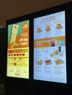 a menu board with images and text