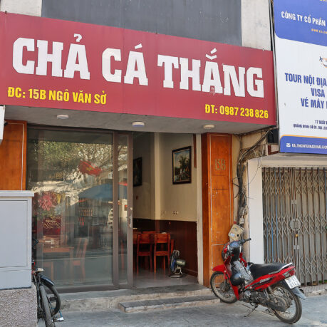 a motorcycle parked outside of a building