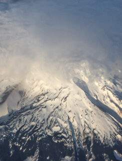 a snow covered mountain top