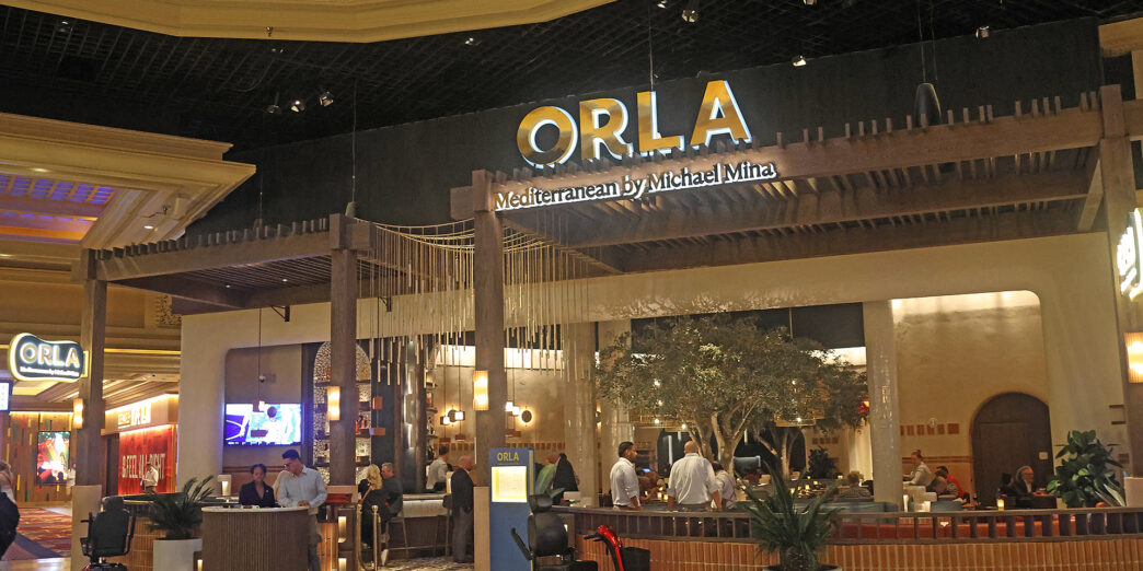 a group of people in a hotel lobby