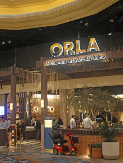 a group of people in a hotel lobby