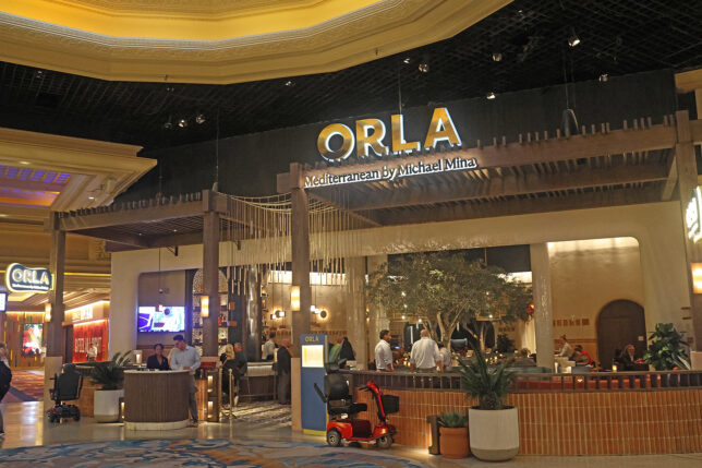 a group of people in a hotel lobby