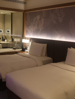 two beds in a hotel room