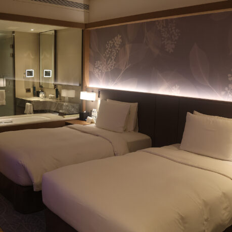 two beds in a hotel room