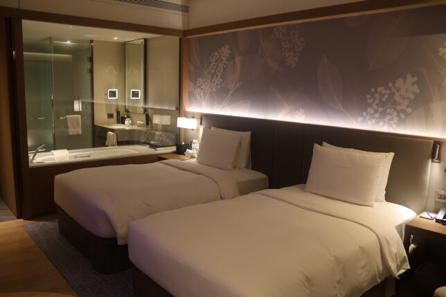 two beds in a hotel room